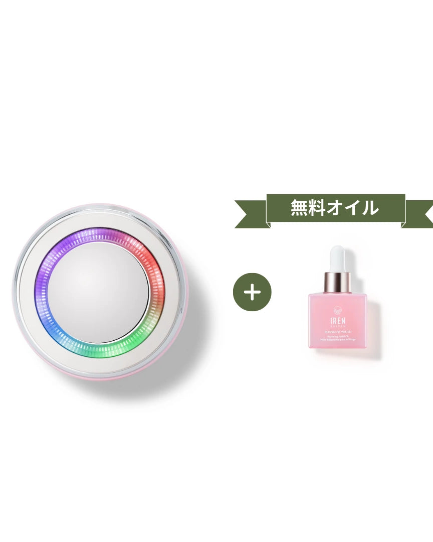 The GLOW ON THE GO Travel Light Kit from IREN Shizen includes a round LED therapy facial cleansing device beside a pink serum bottle labeled "無料オイル" (free oil)—an ideal travel skincare companion. #show-lang-ja #all-groups
