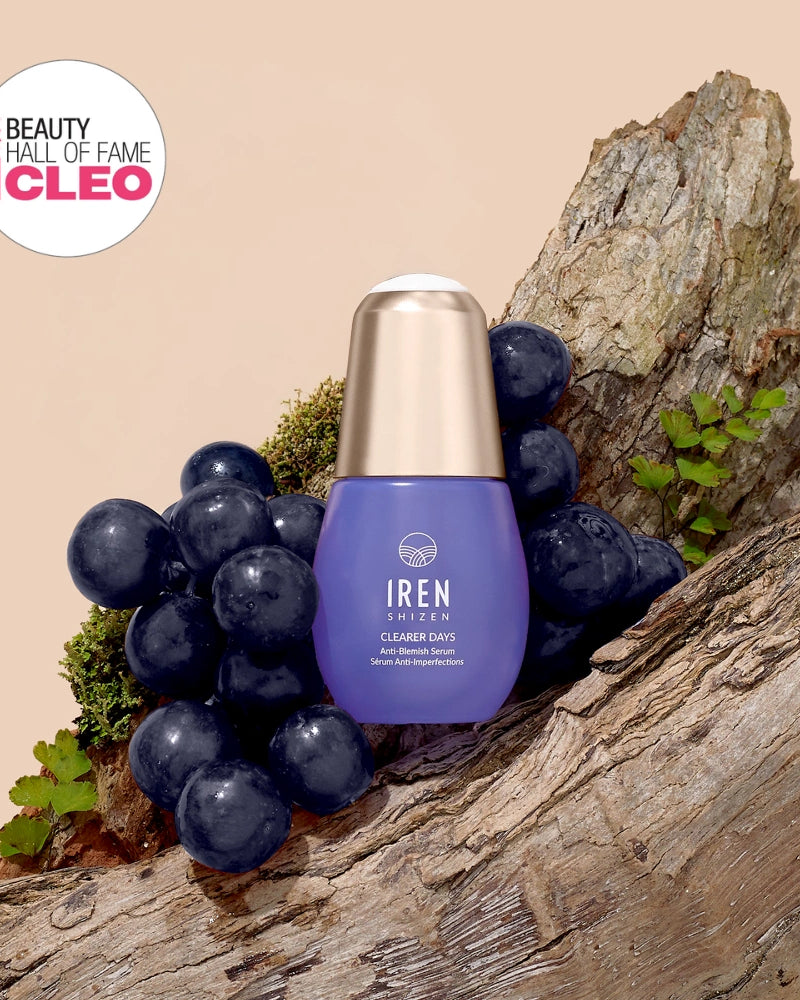 A bottle of IREN Shizen CLEARER DAYS Anti-Blemish Serum sits on a tree trunk with grapes and ferns, featuring a "Beauty Hall of Fame CLEO" award badge in the top left corner.
#all-groups