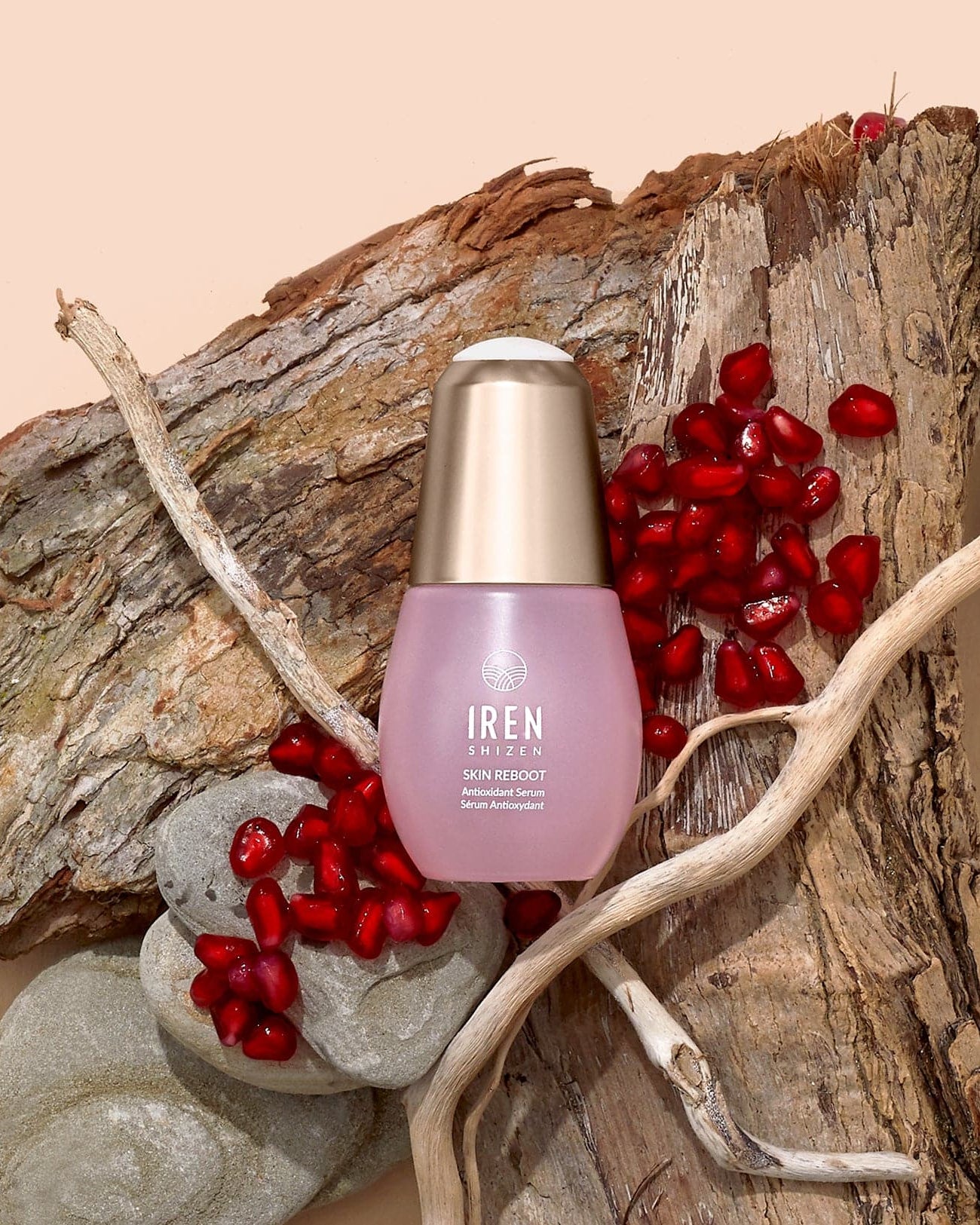 A bottle of customised Japanese SKIN REBOOT Antioxidant Serum by IREN Shizen on top of a piece of wood. #all-groups