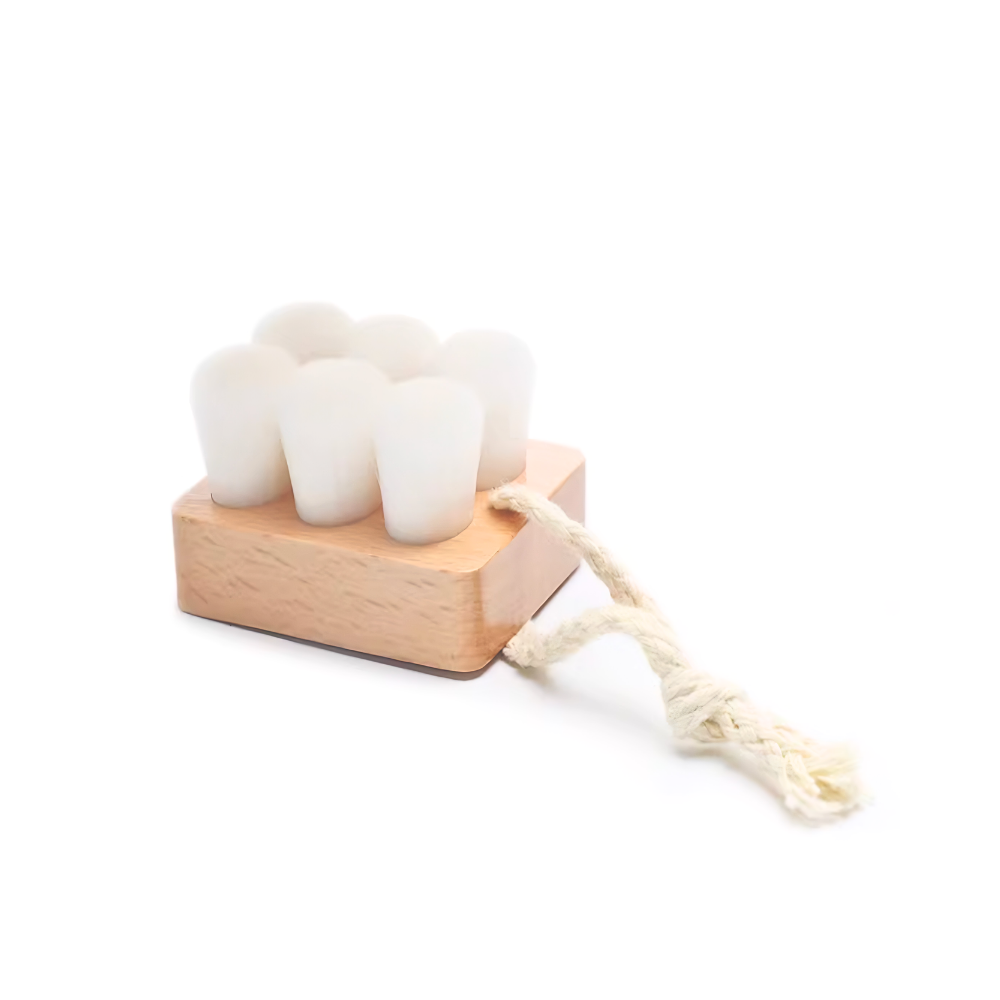 The IREN Shizen Facial Cleansing Brush features ultra-soft bristles and a rope handle for gentle cleansing, shown against a white background.