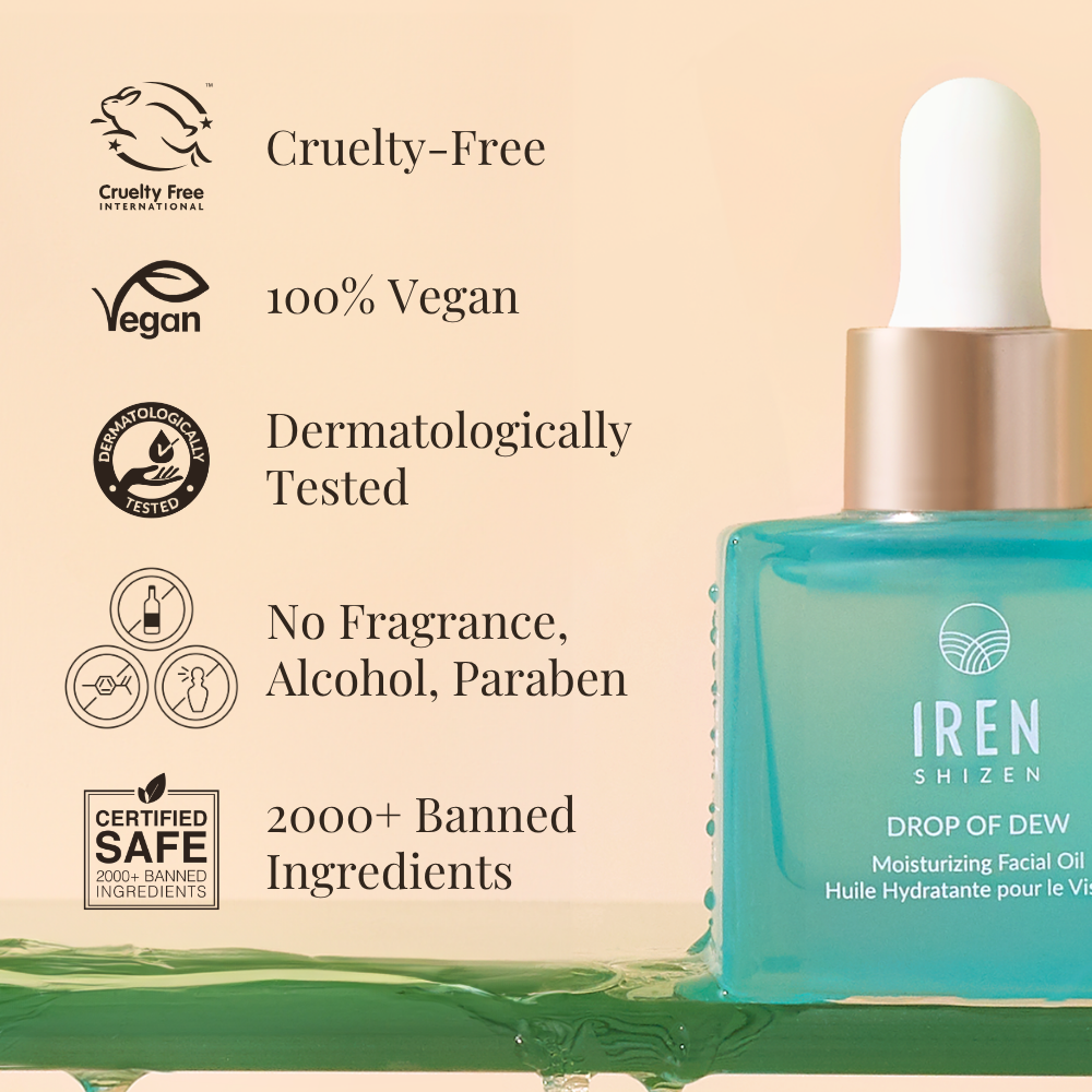 A blue bottle of IREN Shizen DROP OF DEW Moisturizing Facial Oil, emphasizing skin barrier repair, cruelty-free, vegan, dermatologically tested, fragrance/alcohol/paraben-free, free from 2000+ harmful ingredients, with prebiotics and postbiotics.
#show-lang-en