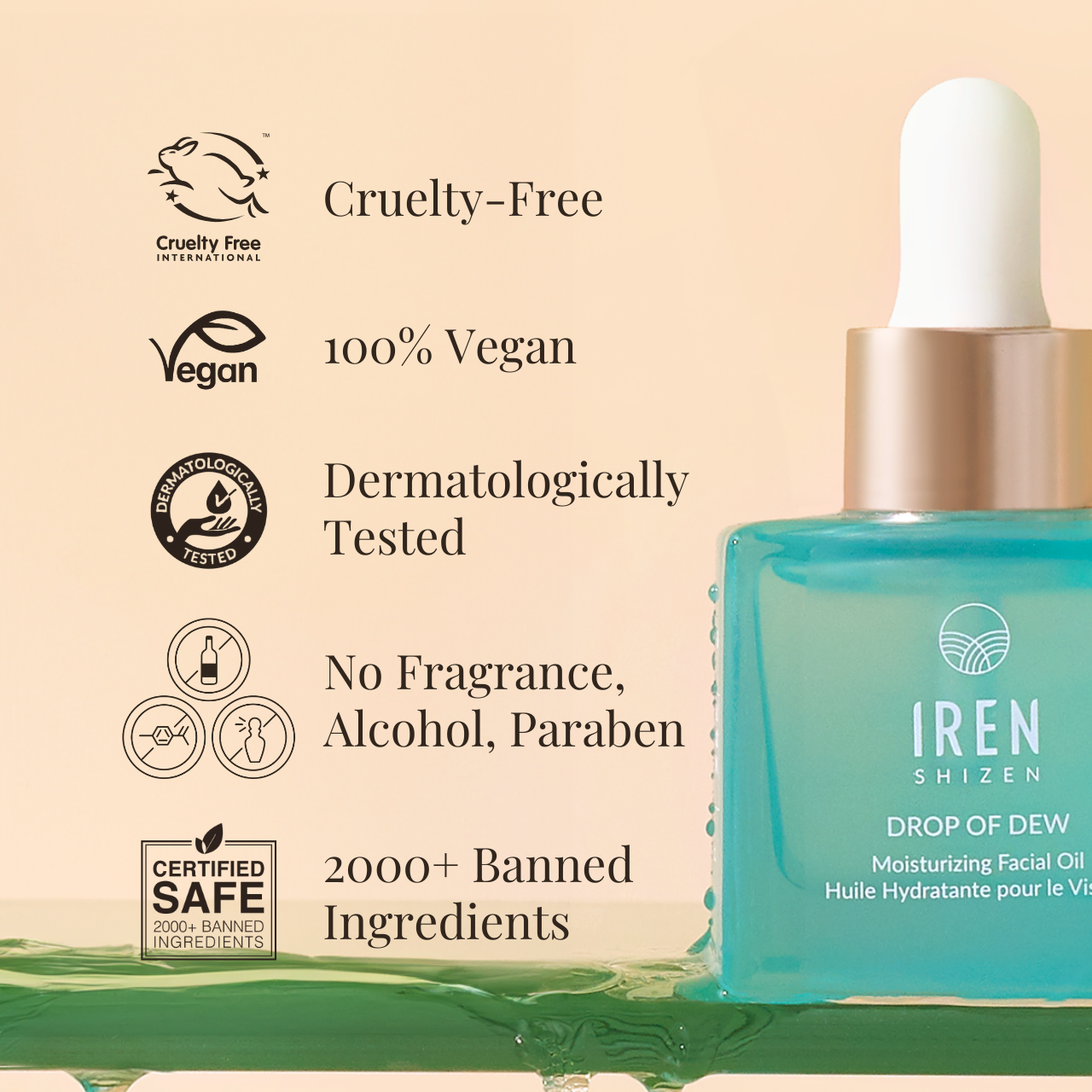 A close-up of the DROP OF DEW Moisturizing Facial Oil by IREN Shizen, featuring labels indicating cruelty-free, 100% vegan, dermatologically tested, free from fragrance, alcohol, and parabens, and comprising over 2000 banned ingredients—expertly formulated for hydration and perfect for sensitive skin. all-groups