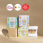 Four GLOW UP Anti-Aging Discovery Kits by IREN Shizen—each with three mini bottles—are displayed against a beige background, showcasing their Cleo, Her World, and Women's Weekly award badges above them.