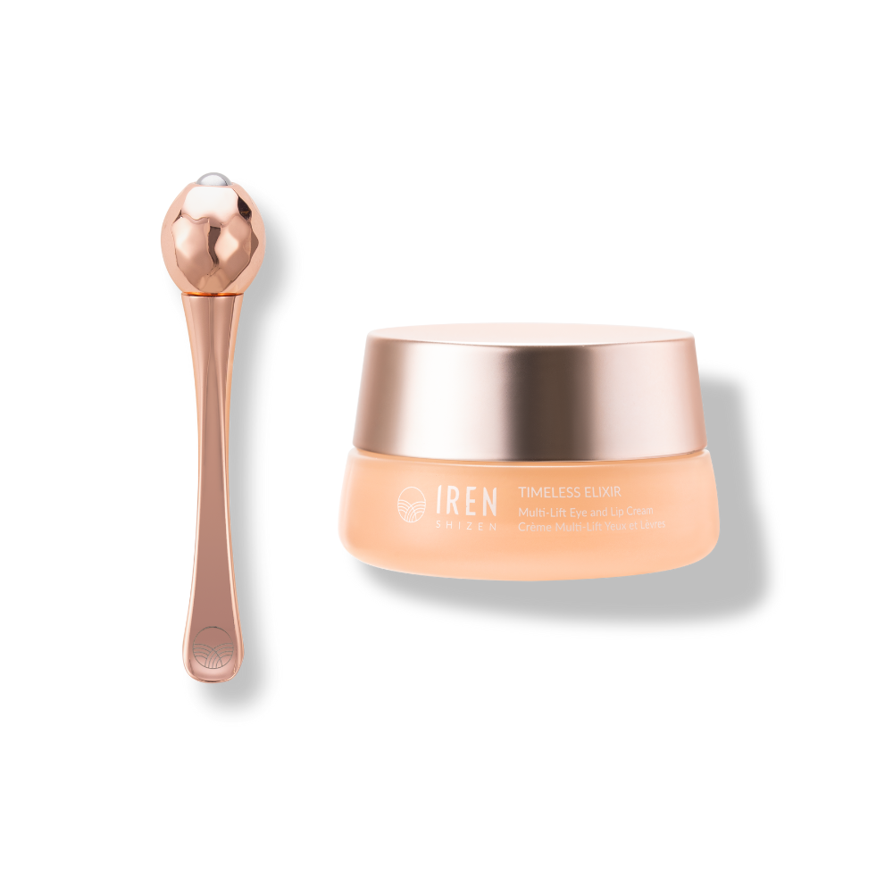 A jar of TIMELESS ELIXIR Multi-Lift Eye and Lip Cream by IREN Shizen with Bakuchiol, accompanied by a rose gold applicator with a spherical end, perfect for eye area rejuvenation and anti-aging. 